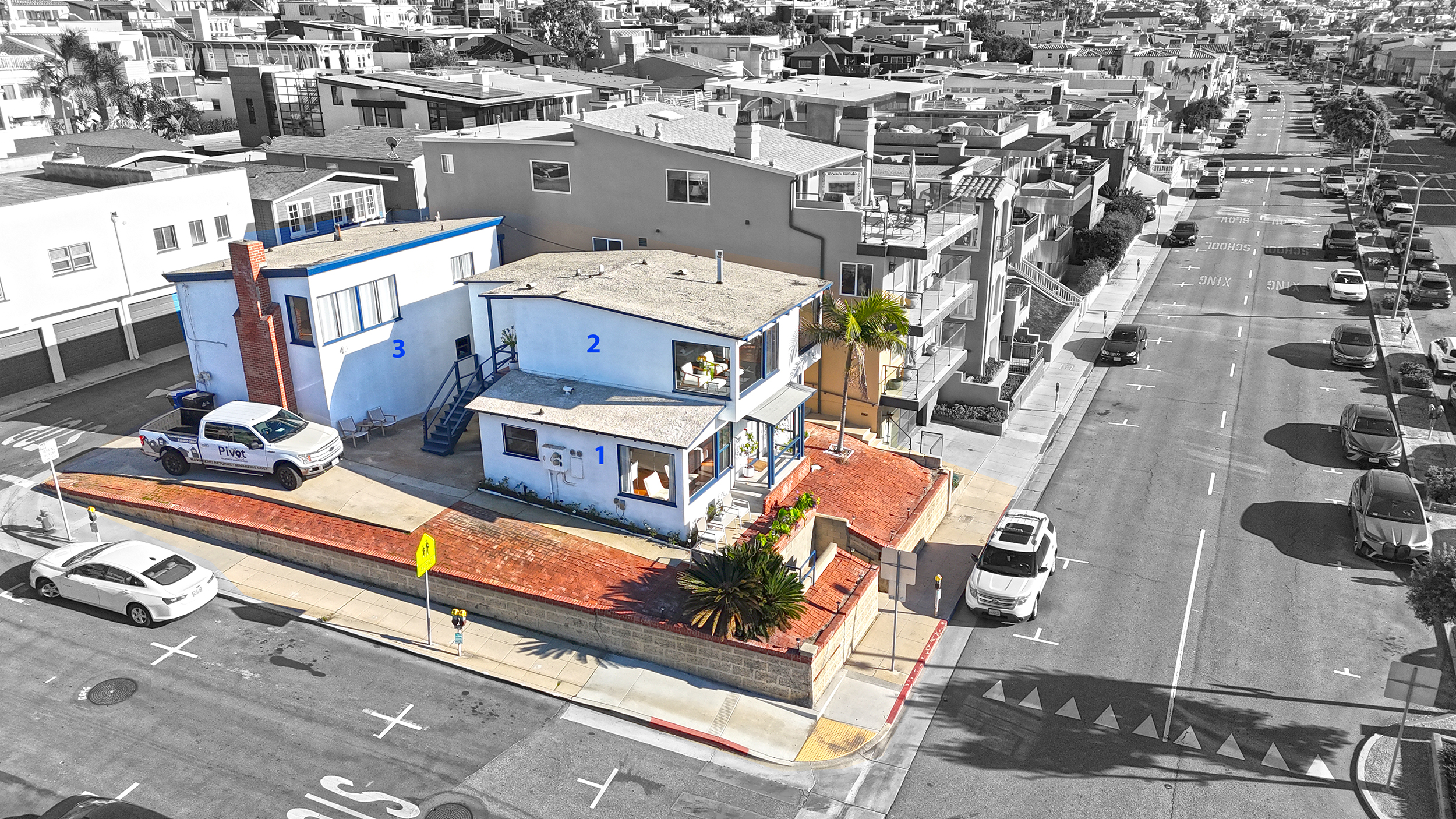 Aerial view showing the three Hermosa Ocean View Rentals bungalows